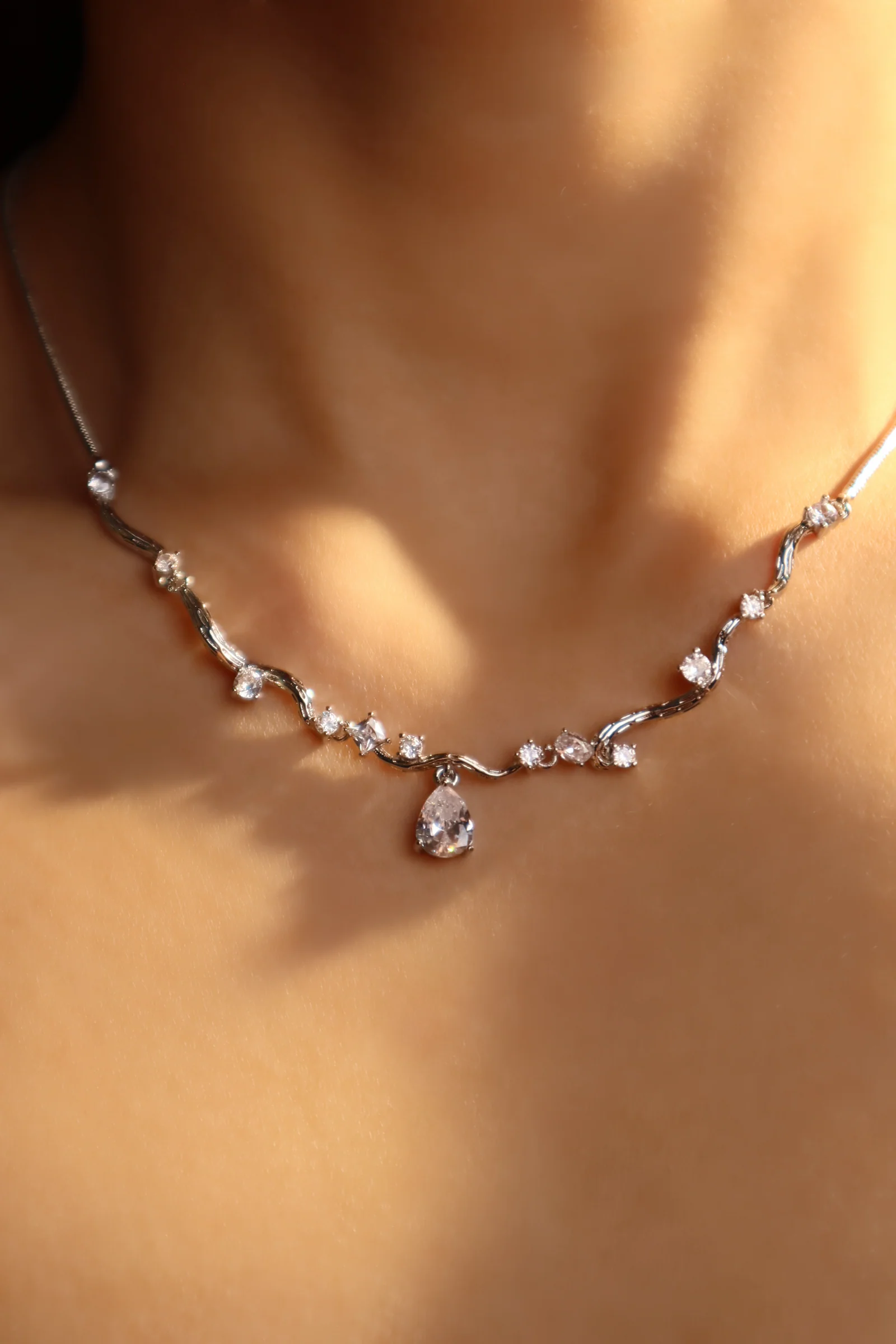 Palladium White Gold Plated Spiral Drop Necklace - Image 13