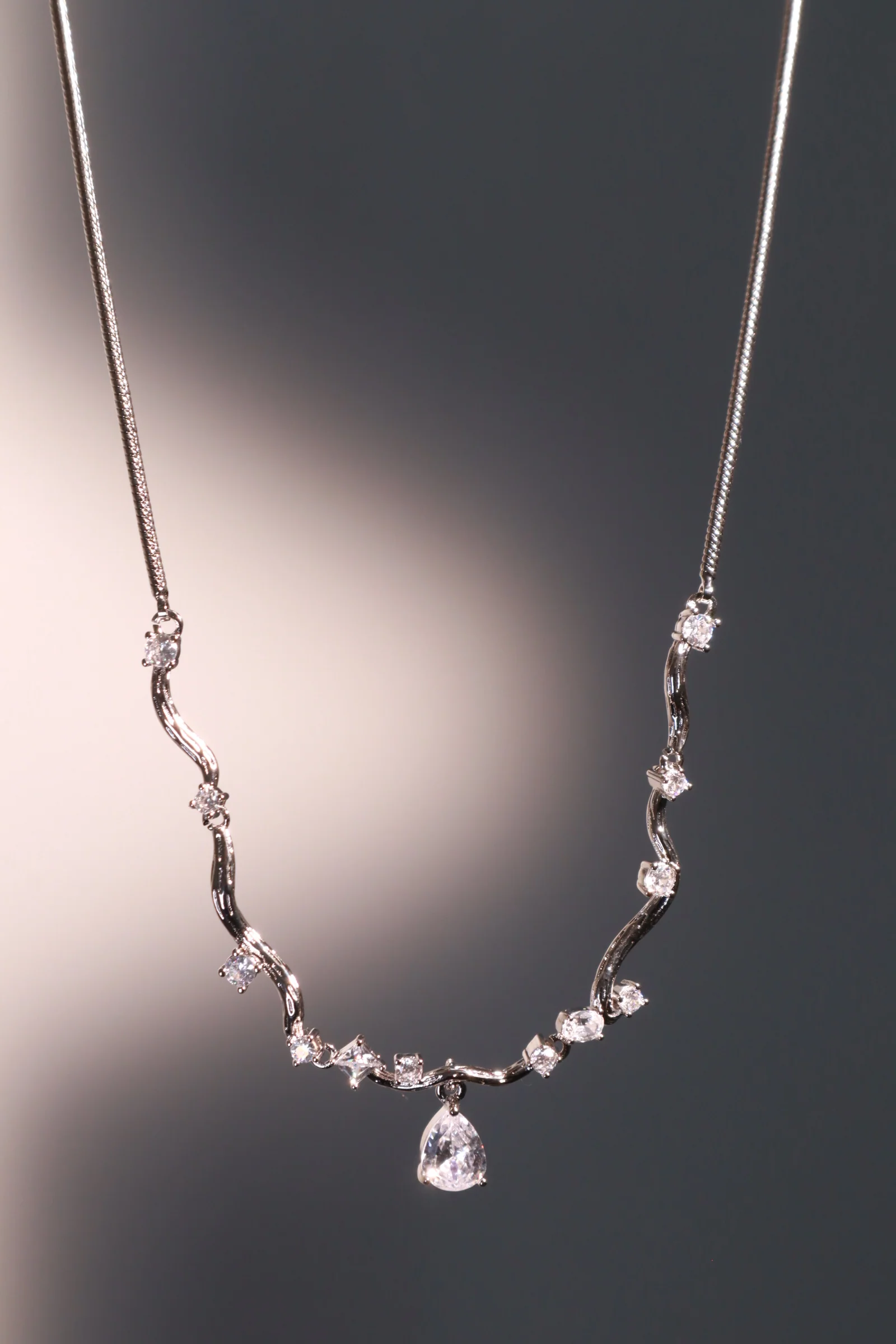 Palladium White Gold Plated Spiral Drop Necklace - Image 7